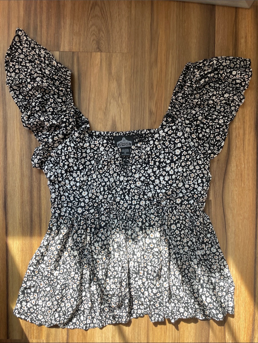NWT Angie Black and White Floral Smocked Peplum Blouse